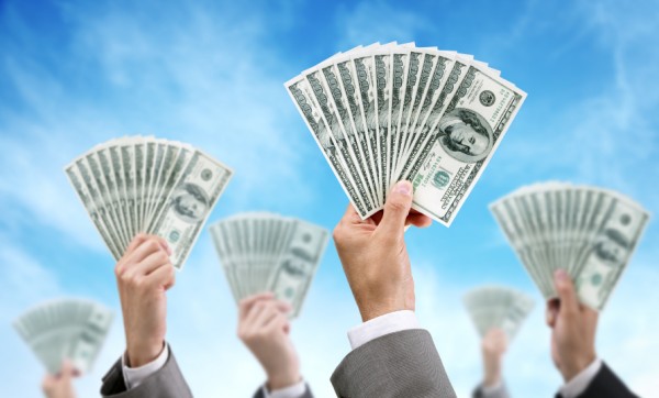 hands holding money