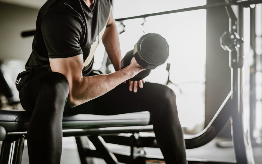 a person working out with a dumbell