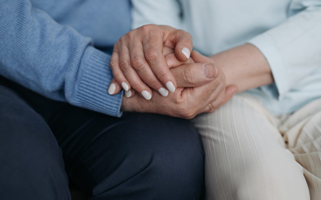 two people holding hands