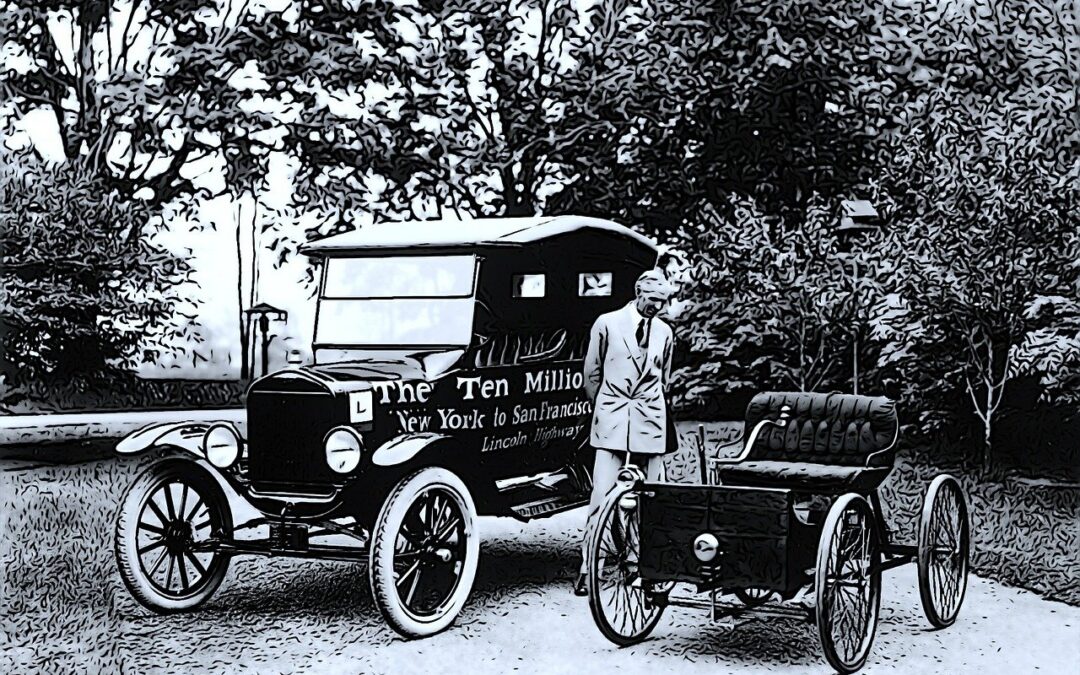 a man standing next to an old car