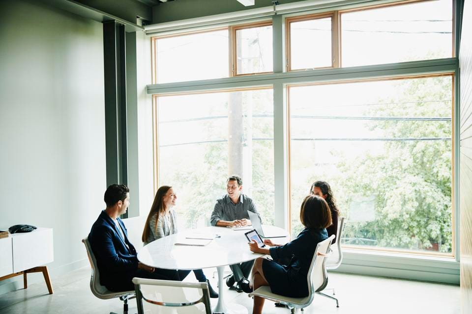 people sitting at the table and chatting